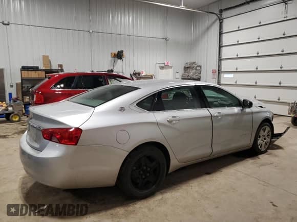 2019 Chevrolet Impala LS с VIN 2G11X5SAXK9141677, выставлен на аукционе Copart как лот 86706424 с пробегом 69 548 миль миль и Списание • Salvage title. История ставок и продаж доступна на DreamBid. Изображение 3.