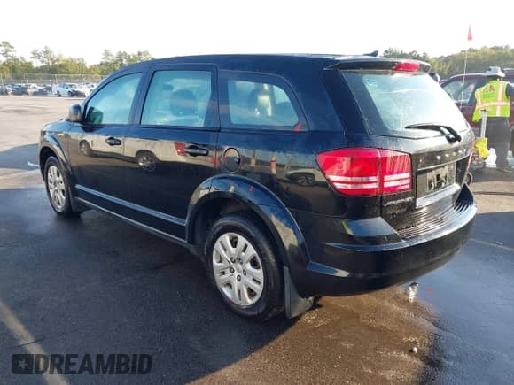 2014 Dodge Journey American Value with VIN 3C4PDCAB5ET198377, listed as a IAAI auction lot 43284974 with 182,058 mi miles and . Bid and sale history available at DreamBid. Image 3.