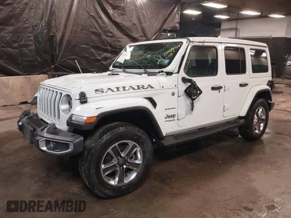 2022 Jeep Wrangler Unlimited Sahara with VIN 1C4HJXEG1NW259602, listed as a IAAI auction lot 41429526 with 31,762 mi miles and . Bid and sale history available at DreamBid. Image 2.