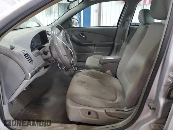 2004 Chevrolet Malibu z VIN 1G1ZS52FX4F152685, wystawiony jako Copart lot #63040175 z przebiegiem 407 264 mil mil oraz Szkoda całkowita • Salvage title. Historia ofert i sprzedaży dostępna na DreamBid. Obrazek 7.