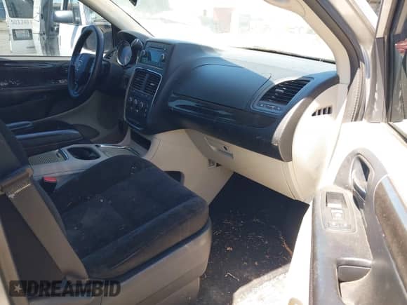 2014 Dodge Grand Caravan SXT 30th Anniversary with VIN 2C4RDGCGXER206694, listed as a IAAI auction lot 42818180 with 123,214 mi miles and . Bid and sale history available at DreamBid. Image 5.