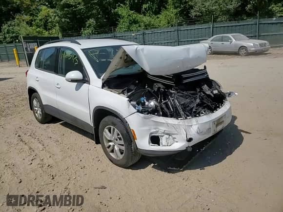 2015 Volkswagen Tiguan SEL with VIN WVGBV7AX5FW582595, listed as a Copart auction lot 68523275 with 128,991 mi miles and Salvage title. Bid and sale history available at DreamBid. Image 14.