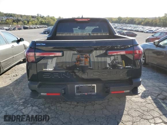 2024 Hyundai Santa Cruz SEL с VIN 5NTJBDAE0RH081096, выставлен на аукционе Copart как лот 75926144 с пробегом 9 702 миль миль и Списание • Salvage title. История ставок и продаж доступна на DreamBid. Изображение 6.