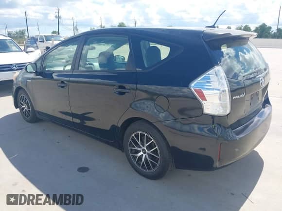2014 Toyota Prius Two with VIN JTDZN3EU6EJ000799, listed as a IAAI auction lot 43394003 with 262,488 mi miles and . Bid and sale history available at DreamBid. Image 3.