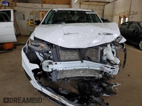 2021 Chevrolet Traverse Premier with VIN 1GNEVKKW6MJ156247, listed as a Copart auction lot 60360505 with 66,182 mi miles and Salvage title. Bid and sale history available at DreamBid. Image 5.