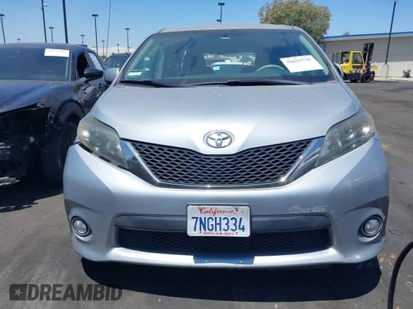 2014 Toyota Sienna SE with VIN 5TDXK3DC8ES417109, listed as a IAAI auction lot 42623735 with 96,234 mi miles and . Bid and sale history available at DreamBid. Image 12.