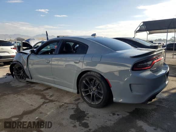 2020 Dodge Charger Scat Pack z VIN 2C3CDXGJ5LH244367, wystawiony jako Copart lot #81485415 z przebiegiem 69 044 mil mil oraz Szkoda całkowita • Salvage title. Historia ofert i sprzedaży dostępna na DreamBid. Obrazek 2.