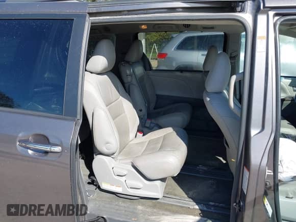 2016 Toyota Sienna XLE with VIN 5TDYK3DC1GS745866, listed as a IAAI auction lot 43318099 with 148,339 mi miles and . Bid and sale history available at DreamBid. Image 8.
