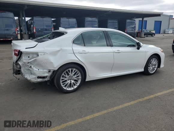 2020 Toyota Camry Hybrid XLE with VIN 4T1F31AK6LU530201, listed as a Copart auction lot 81698794 with 50,695 mi miles and Salvage title. Bid and sale history available at DreamBid. Image 3.