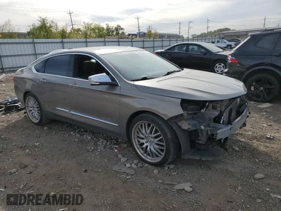 2017 Chevrolet Impala Premier with VIN 2G1145S33H9147341, listed as a Copart auction lot 84023395 with 123,402 mi miles and Salvage title. Bid and sale history available at DreamBid. Image 4.