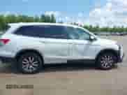 2020 Honda Pilot EX z VIN 5FNYF6H37LB047115, wystawiony jako IAAI lot #42833904 z przebiegiem 77 857 mil mil oraz . Historia ofert i sprzedaży dostępna na DreamBid. Obrazek 14.