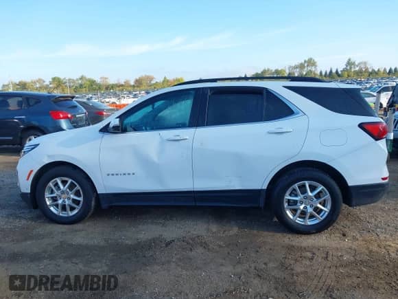 2022 Chevrolet Equinox LT z VIN 3GNAXUEV2NL222147, wystawiony jako IAAI lot #43434774 z przebiegiem 83 228 mil mil oraz . Historia ofert i sprzedaży dostępna na DreamBid. Obrazek 14.