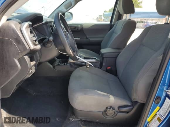 2018 Toyota Tacoma SR5 с VIN 5TFAZ5CN7JX065614, выставлен на аукционе Copart как лот 84872725 с пробегом 127 334 миль миль и Списание • Salvage title. История ставок и продаж доступна на DreamBid. Изображение 7.