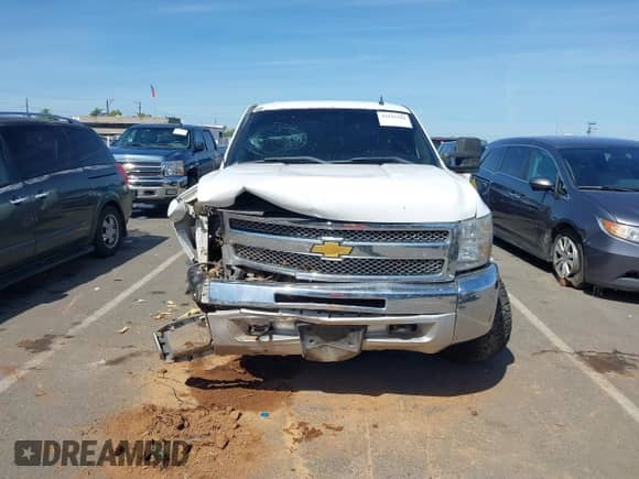 2013 Chevrolet Silverado 1500 LT z VIN 3GCPKSE73DG330355, wystawiony jako IAAI lot #42241946 z przebiegiem Nie podano mil oraz . Historia ofert i sprzedaży dostępna na DreamBid. Obrazek 11.