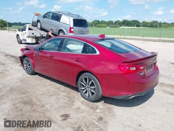 2020 Chevrolet Malibu RS with VIN 1G1ZG5ST7LF057085, listed as a IAAI auction lot 42847965 with 51,671 mi miles and . Bid and sale history available at DreamBid. Image 3.