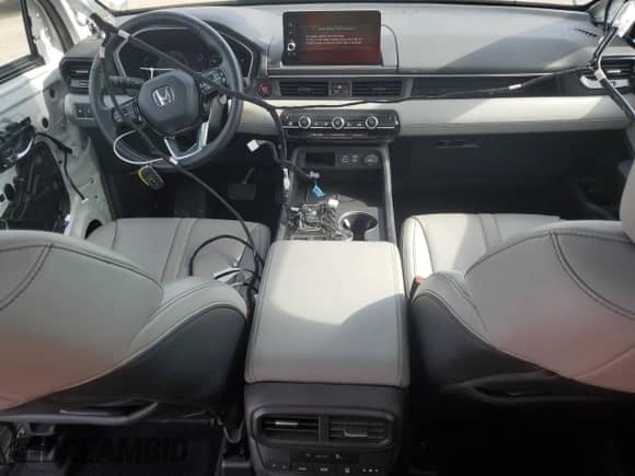 2023 Honda Pilot Touring с VIN 5FNYG2H71PB002492, выставлен на аукционе Copart как лот 41790915 с пробегом 18 450 миль миль и Списание • Salvage title. История ставок и продаж доступна на DreamBid. Изображение 8.