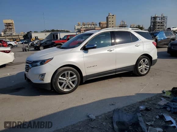 2018 Chevrolet Equinox Premier with VIN 2GNAXMEV7J6214978, listed as a Copart auction lot 69108875 with 63,716 mi miles and Salvage title. Bid and sale history available at DreamBid. Image 1.