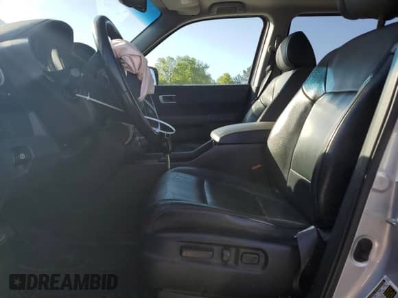 2014 Honda Pilot EX-L with VIN 5FNYF3H6XEB017828, listed as a Copart auction lot 53206475 with 217,412 mi miles and Salvage title. Bid and sale history available at DreamBid. Image 7.