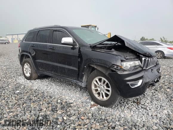 2018 Jeep Grand Cherokee Laredo E with VIN 1C4RJEAG1JC451192, listed as a Copart auction lot 65430435 with 177,827 mi miles and Salvage title. Bid and sale history available at DreamBid. Image 4.