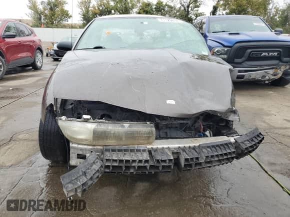 1999 Saturn SL с VIN 1G8ZF5281XZ252460, выставлен на аукционе Copart как лот 71125634 с пробегом Не указан миль и Списание • Salvage title. История ставок и продаж доступна на DreamBid. Изображение 5.