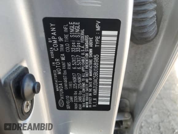 2011 Hyundai Tucson GLS z VIN KM8JU3AC5BU168985, wystawiony jako Copart lot #70140285 z przebiegiem 86 951 mil mil oraz Szkoda całkowita • Salvage title. Historia ofert i sprzedaży dostępna na DreamBid. Obrazek 13.