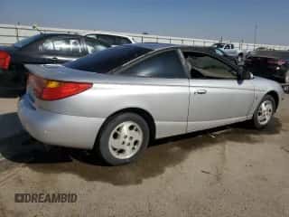 2002 Saturn SC с VIN 1G8ZY12712Z186012, выставлен на аукционе Copart как лот 68756684 с пробегом 140 205 миль миль и Чистый • Clean title. История ставок и продаж доступна на DreamBid. Изображение 3.