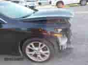 2014 Nissan Maxima SV z VIN 1N4AA5AP4EC458095, wystawiony jako IAAI lot #43038478 z przebiegiem 94 038 mil mil oraz . Historia ofert i sprzedaży dostępna na DreamBid. Obrazek 12.