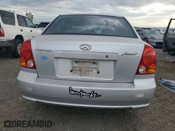 2005 Hyundai Accent GLS z VIN KMHCG45C25U604342, wystawiony jako Copart lot #85380125 z przebiegiem 165 690 mil mil oraz Czysty tytuł • Clean title. Historia ofert i sprzedaży dostępna na DreamBid. Obrazek 6.