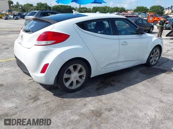 2015 Hyundai Veloster with VIN KMHTC6AD1FU237831, listed as a IAAI auction lot 43379985 with 78,173 mi miles and . Bid and sale history available at DreamBid. Image 4.