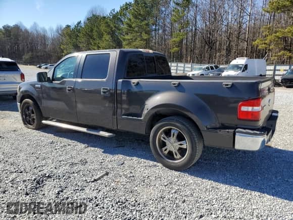 2006 Ford F-150 XLT with VIN 1FTRW02W06KD64679, listed as a Copart auction lot 88233135 with 188,608 mi miles and Clean title. Bid and sale history available at DreamBid. Image 2.