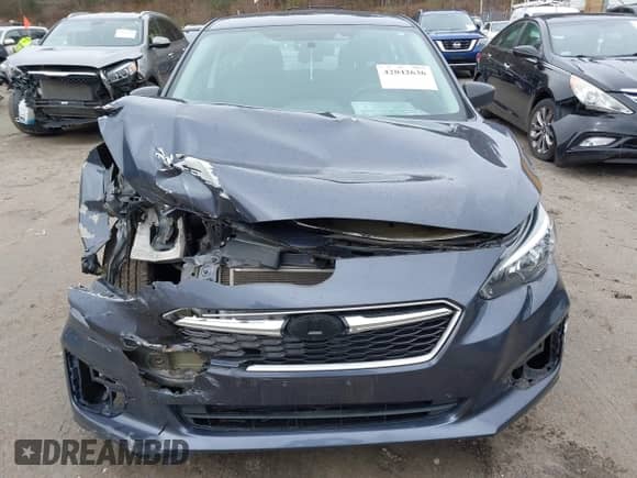 2017 Subaru Impreza with VIN 4S3GKAA63H3603908, listed as a IAAI auction lot 42042636 with 62,697 mi miles and . Bid and sale history available at DreamBid. Image 6.