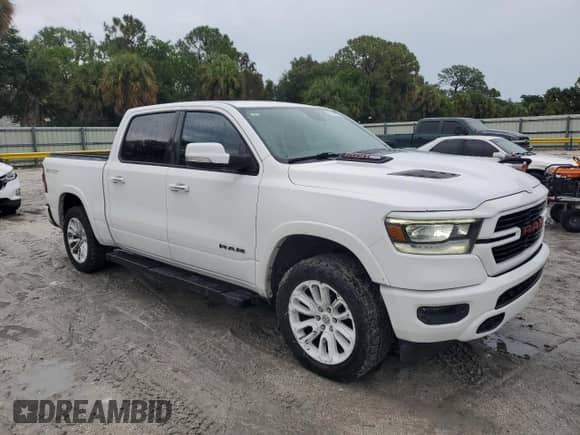 2020 Ram 1500 Laramie z VIN 1C6RREJT7LN160720, wystawiony jako Copart lot #70410455 z przebiegiem 55 863 mil mil oraz Nie do naprawy • Non repairable. Historia ofert i sprzedaży dostępna na DreamBid. Obrazek 4.