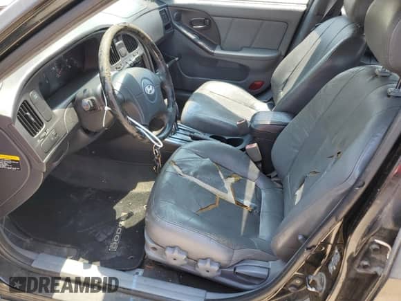 2005 Hyundai Elantra GLS с VIN KMHDN56D35U148035, выставлен на аукционе Copart как лот 59706515 с пробегом 149 370 миль миль и Списание • Salvage title. История ставок и продаж доступна на DreamBid. Изображение 7.