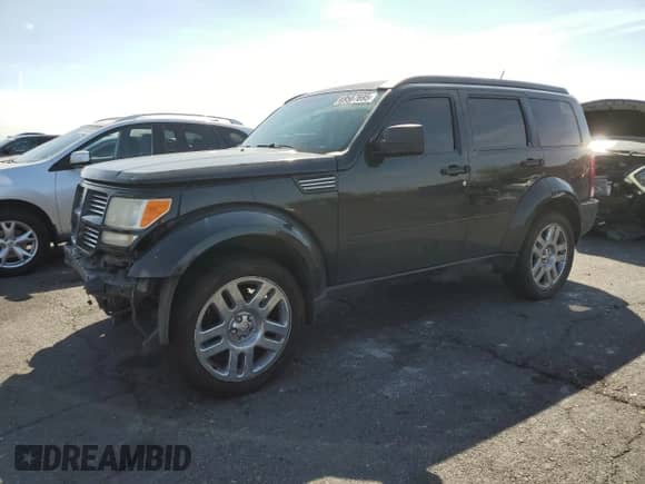 2011 Dodge Nitro Heat with VIN 1D4PT4GK6BW607981, listed as a Copart auction lot 69587695 with 160,495 mi miles and Salvage title. Bid and sale history available at DreamBid. Image 1.