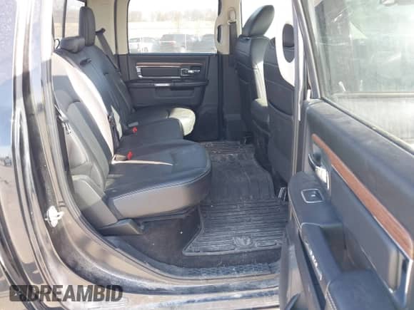 2018 Ram 1500 Laramie with VIN 1C6RR7NT2JS114085, listed as a IAAI auction lot 41794265 with 121,206 mi miles and . Bid and sale history available at DreamBid. Image 8.