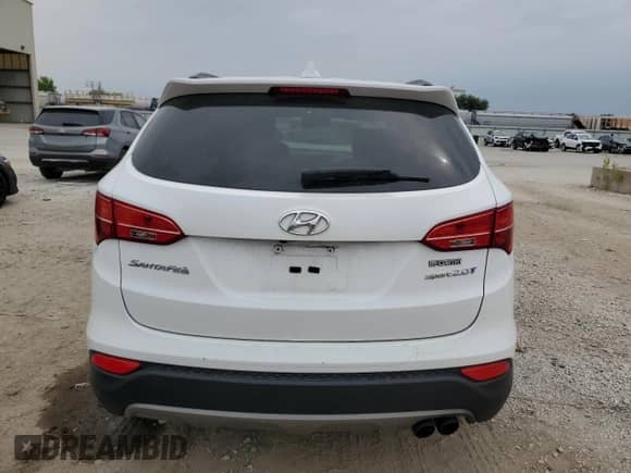 2014 Hyundai Santa Fe с VIN 5XYZU3LA3EG219084, выставлен на аукционе Copart как лот 71632985 с пробегом 100 785 миль миль и Списание • Salvage title. История ставок и продаж доступна на DreamBid. Изображение 6.