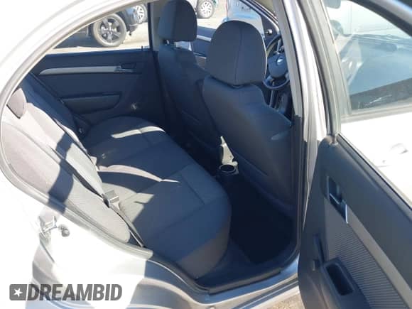 2009 Chevrolet Aveo 1LT z VIN KL1TD56E89B326736, wystawiony jako IAAI lot #43506009 z przebiegiem 106 025 mil mil oraz . Historia ofert i sprzedaży dostępna na DreamBid. Obrazek 8.