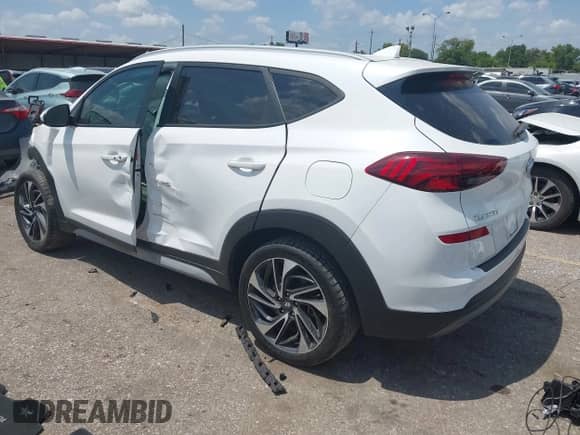 2021 Hyundai Tucson Ultimate with VIN KM8J33AL5MU353009, listed as a IAAI auction lot 42991279 with 36,492 mi miles and . Bid and sale history available at DreamBid. Image 3.