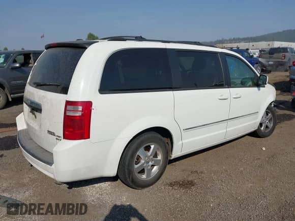 2009 Dodge Grand Caravan SXT with VIN 2D8HN541X9R627930, listed as a IAAI auction lot 43121675 with 184,278 mi miles and . Bid and sale history available at DreamBid. Image 4.