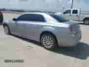 2013 Chrysler 300 with VIN 2C3CCAAG9DH727908, listed as a IAAI auction lot 42702399 with 105,987 mi miles and . Bid and sale history available at DreamBid. Image 3.