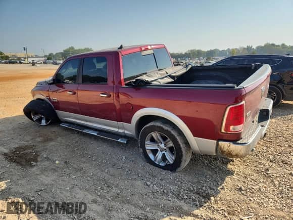 2014 Ram 1500 Laramie with VIN 1C6RR7NT1ES340818, listed as a Copart auction lot 80324675 with 445,556 mi miles and Salvage title. Bid and sale history available at DreamBid. Image 2.
