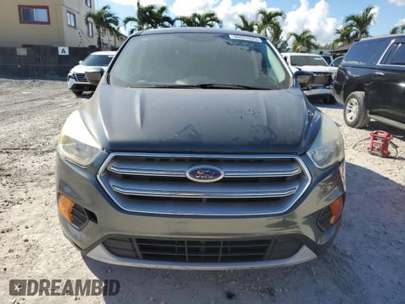 2017 Ford Escape SE z VIN 1FMCU9GD3HUC39198, wystawiony jako Copart lot #90023225 z przebiegiem 150 567 mil mil oraz Czysty tytuł • Clean title. Historia ofert i sprzedaży dostępna na DreamBid. Obrazek 5.