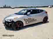 2013 Hyundai Veloster w/Black Int z VIN KMHTC6AD9DU147646, wystawiony jako Copart lot #58495585 z przebiegiem 121 781 mil mil oraz Szkoda całkowita • Salvage title. Historia ofert i sprzedaży dostępna na DreamBid. Obrazek 1.