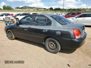 2005 Hyundai Elantra GLS z VIN KMHDN46D45U021031, wystawiony jako Copart lot #70877694 z przebiegiem 184 824 mil mil oraz Szkoda całkowita • Salvage title. Historia ofert i sprzedaży dostępna na DreamBid. Obrazek 2.