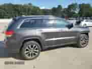 2017 Jeep Grand Cherokee Overland with VIN 1C4RJECGXHC916964, listed as a Copart auction lot 80358275 with 169,868 mi miles and Salvage title. Bid and sale history available at DreamBid. Image 3.