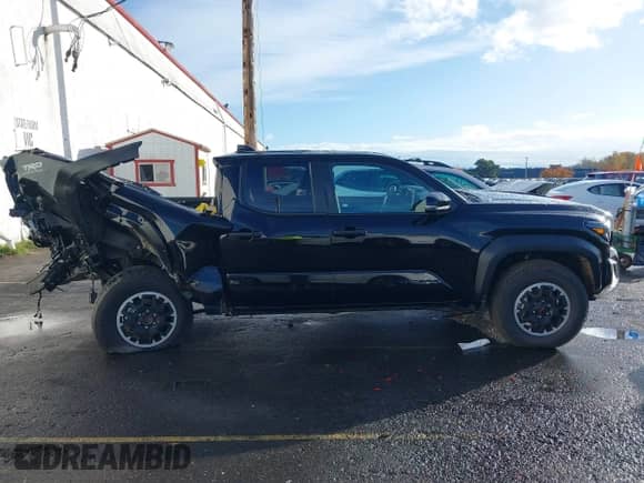 2024 Toyota Tacoma SR5 with VIN 3TMLB5JNXRM049327, listed as a IAAI auction lot 40906568 with 691 mi miles and . Bid and sale history available at DreamBid. Image 13.