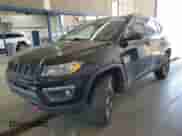 2017 Jeep Compass Trailhawk with VIN 3C4NJDDBXHT647011, listed as a Copart auction lot 65583185 with 106,438 mi miles and Salvage title. Bid and sale history available at DreamBid. Image 1.