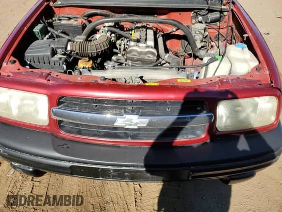 1999 Chevrolet Tracker z VIN 2CNBJ13C2X6911316, wystawiony jako Copart lot #74851094 z przebiegiem Nie podano mil oraz Szkoda całkowita • Salvage title. Historia ofert i sprzedaży dostępna na DreamBid. Obrazek 13.