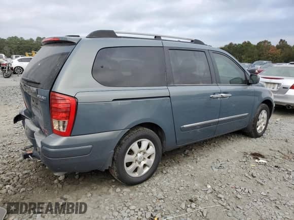 2007 Hyundai Entourage GLS with VIN KNDMC233676034624, listed as a Copart auction lot 77761734 with 215,206 mi miles and Salvage title. Bid and sale history available at DreamBid. Image 3.