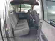 2003 Dodge Dakota Sport z VIN 1D7HL38X23S234409, wystawiony jako IAAI lot #42091746 z przebiegiem 340 484 mil mil oraz . Historia ofert i sprzedaży dostępna na DreamBid. Obrazek 8.